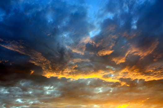 Dramatic color cloudy sky. Evening in the summer