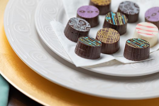 Artisan Fine Chocolate Candy On Serving Dish.