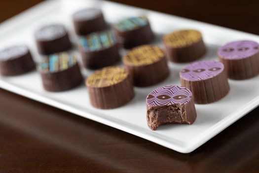 Artisan Fine Chocolate Candy On Serving Dish.