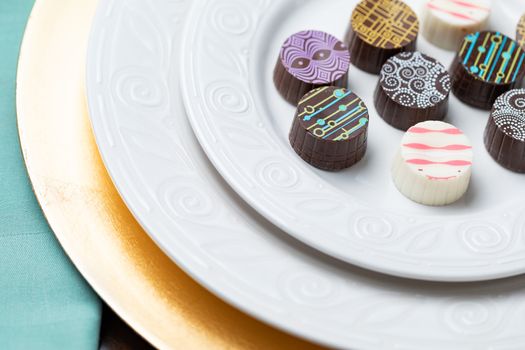 Artisan Fine Chocolate Candy On Serving Dish.