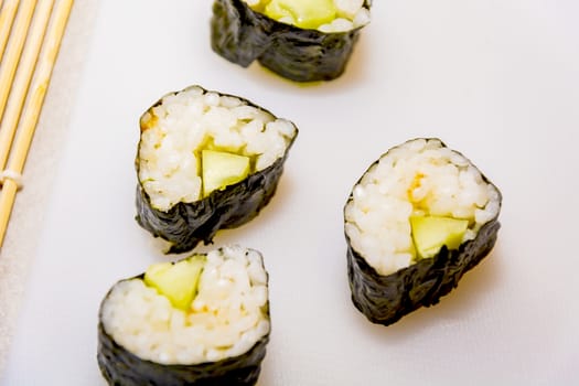 Traditional japanese avocado sushi rolls