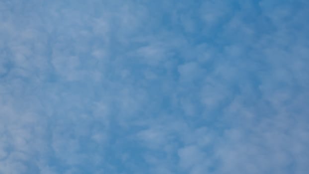 white clouds in the blue sky background