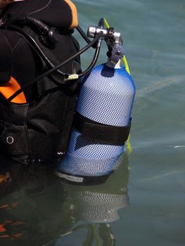 Closeup on Scuba Diving Equipment on backside of Diver in Water