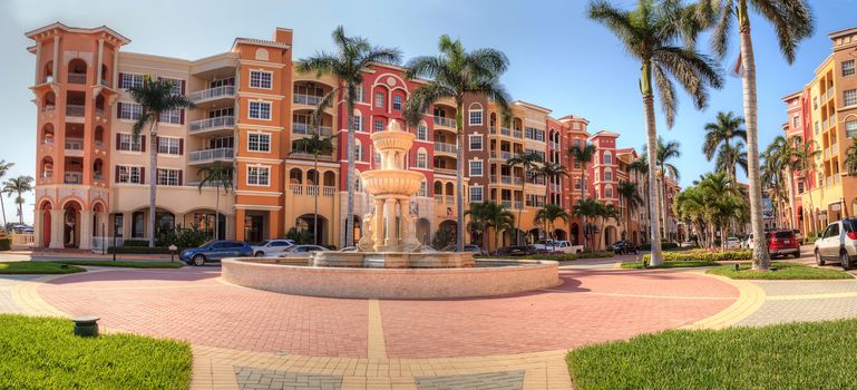 Naples, Florida, USA – April 29, 2018: Colorful Shops and fountains along 3rd street along the harbor in Naples, Florida