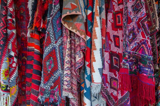 Assortment of turkish oriental carpets in street market