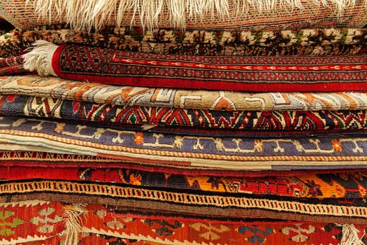 Assortment of turkish oriental carpets in street market