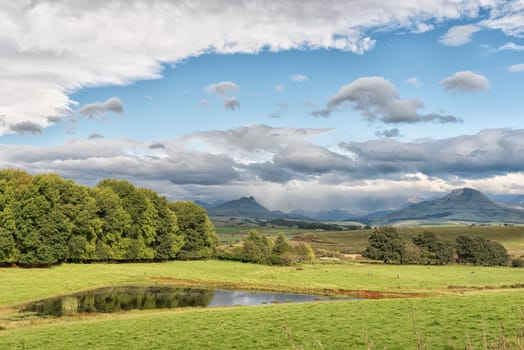 A landscape on the P317-road to Garden Castle in the Drakensberg near Underberg in the Kwazulu-Natal Province