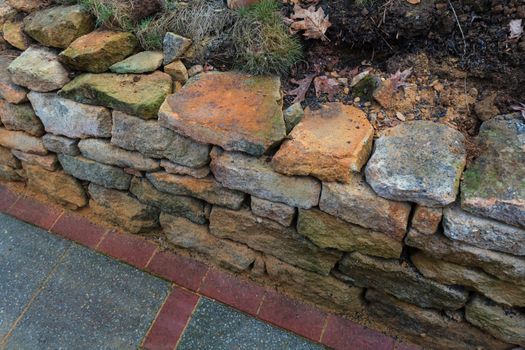 Natural stone wall dry laid with sandstone from the city of Rheine.