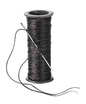 spool of black thread on white isolated background