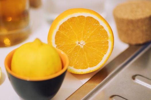 Citrus fruit cut in half - oranges, lemons, tangerines, grapefruit on a wooden background