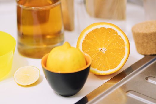 Citrus fruit cut in half - oranges, lemons, tangerines, grapefruit on a wooden background