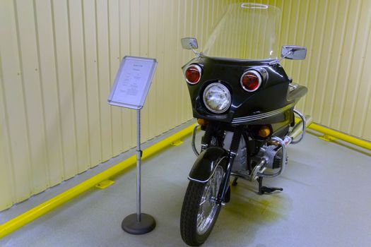 KYIV, UKRAINE - MARCH 25, 2016: An old motorcycle at an automobile exhibition in Mezhgore Ukraine 