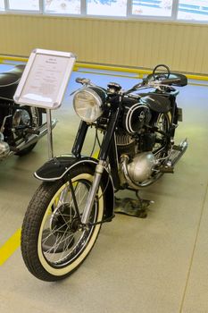 KYIV, UKRAINE - MARCH 25, 2016: An old motorcycle at an automobile exhibition in Mezhgore Ukraine 