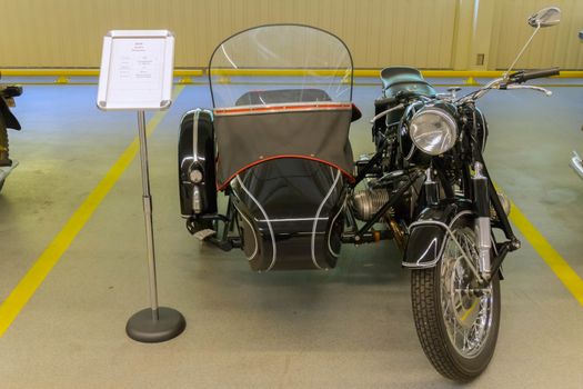 KYIV, UKRAINE - MARCH 25, 2016: An old motorcycle at an automobile exhibition in Mezhgore Ukraine 