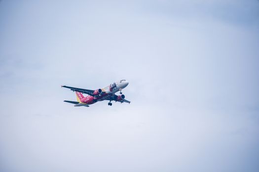 Bangkok, Thailand - May 4, 2018: Vietjet airbus approaches runway for a landing at Suvarnabhumi International Airport, Bangkok, Thailand.