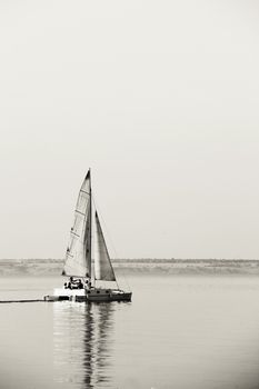 sailing ship in the open sea. black and white. a photo