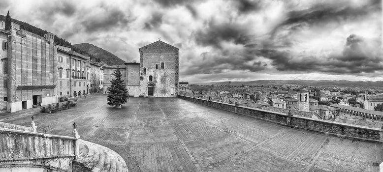 Panoramic view of Piazza Grande, scenic main square in Gubbio, one of the most beautiful medieval towns in central Italy