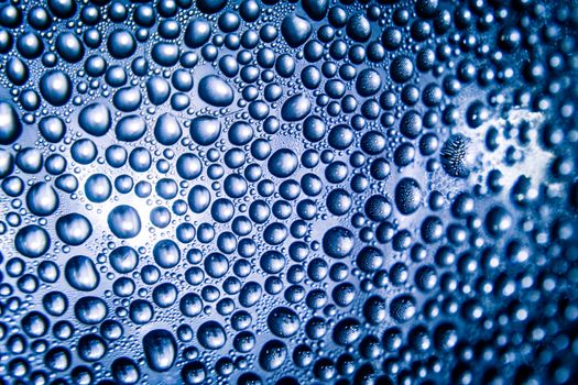 Texture of water drops on bottle for background