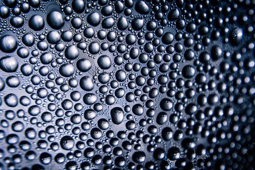 Texture of water drops on bottle for background