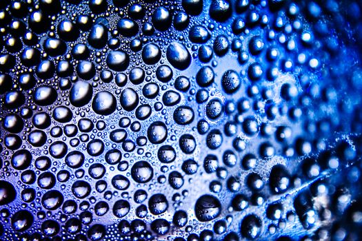 Texture of water drops on bottle for background