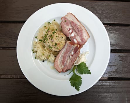Steewed cabbages and bacon, view from above