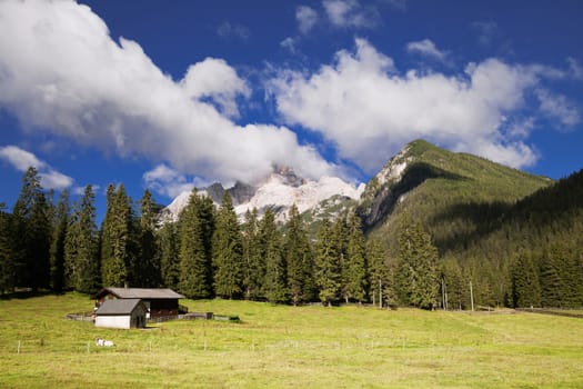 Farm in Dolomites on a sunny day