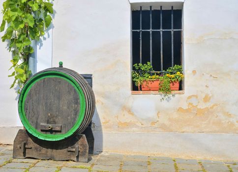 Old wooden barrel for wine. Classical wine cellar in Europe. Wine scenary. 