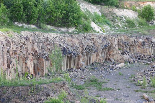 Basalt columns rock quarry. Beautiful stone landscape