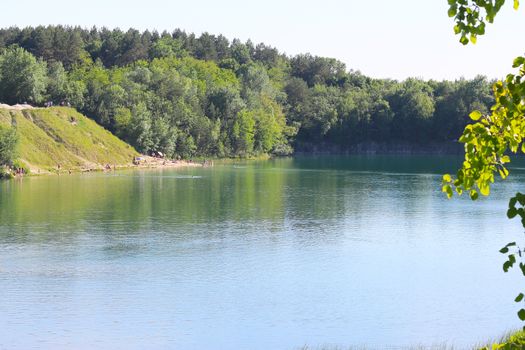 Wild beach on a beautiful lake. Beautiful sunny landscape