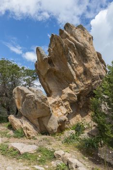 landscape of sardinia iin spring on sunny day in taly with rocks and blue sky as background