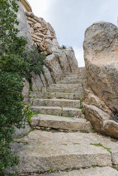 stairs track to the landmark of capo orso in sardinia italy, capo dorso is a landmark wth beautifull rocks at the costa emeralda