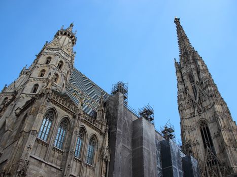 Stephansdom Church in Vienna Austria under repair with Blue Sky