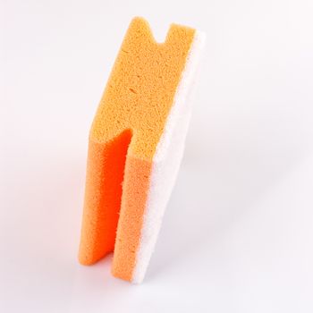 colored sponges close up cleaners, detergents, household cleaning sponge for cleaning on white background