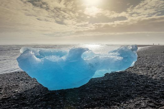 Ice on the black beach near Jokulsarlon glacier lagoon, daimond beach, Iceland.