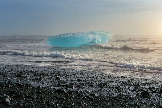 Ice on the black beach near Jokulsarlon glacier lagoon, daimond beach, Iceland.