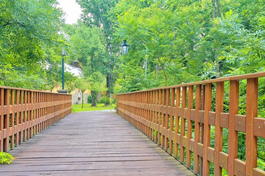 Wooden bridge in town, natural vintage background.