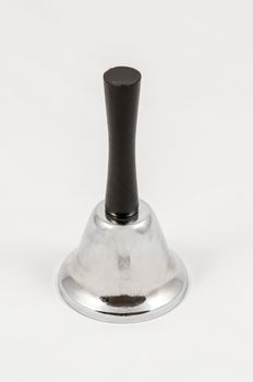 Vintage handbell isolated on white background