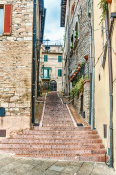 Walking in the picturesque and ancient streets of Assisi, one of the most beautiful medieval towns in central Italy