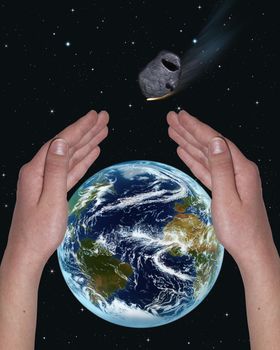 hands covering the world from a meteorite on the background of stars