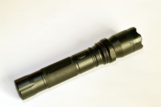 rechargeable LED flashlight on a white background