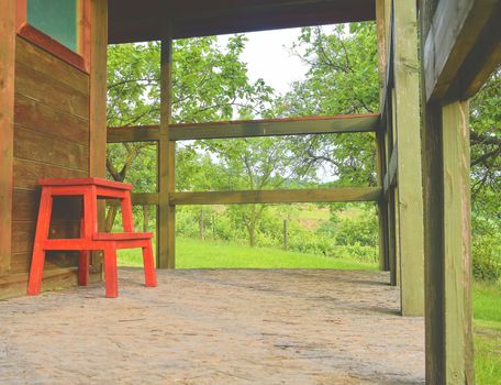 Wooden garden shed in a beautiful rural orchard. Close-up.