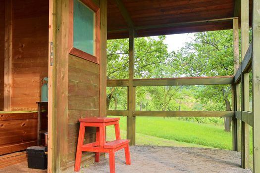 Small house cabin shed. Cute summer cabin in rural orchard.  Close-up.