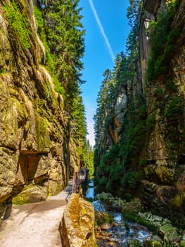 Narrow gorge under Kamienczyk waterfall in Giant Mountains, Poland.