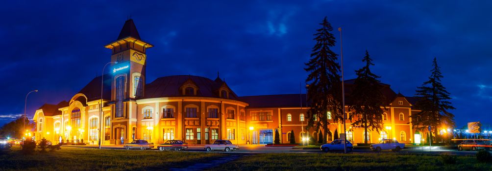 Uzhgorod, Ukraine - SEP 28, 2008: Panorama of beautiful railway station building at night