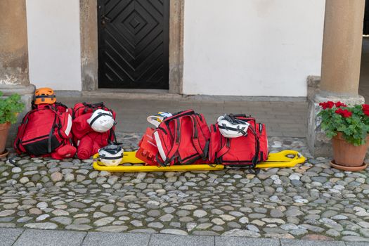 Paramedics rescue gear and first aid backpack on strechers, emergency services, ambulance equipment, medical aid