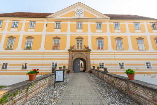 Courtyard of castle in Slovenska Bistrica with front entrance, the courtyard is used today as a grocery market, publicly owned, no release required