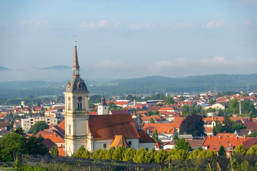 Panoramic view of Slovenska Bistrica, Slovenia, the church of St. Bartholomew dominates the towns skyline