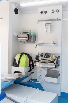 Interior of an ambulance car, various medical equipment