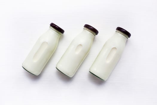 milk bottle on white background. Top view