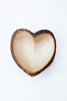 Heart shape dish on white background.